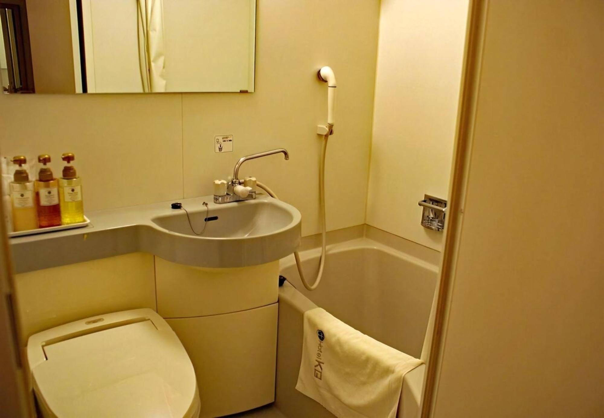 Business Hotel Kg Oita Exterior foto